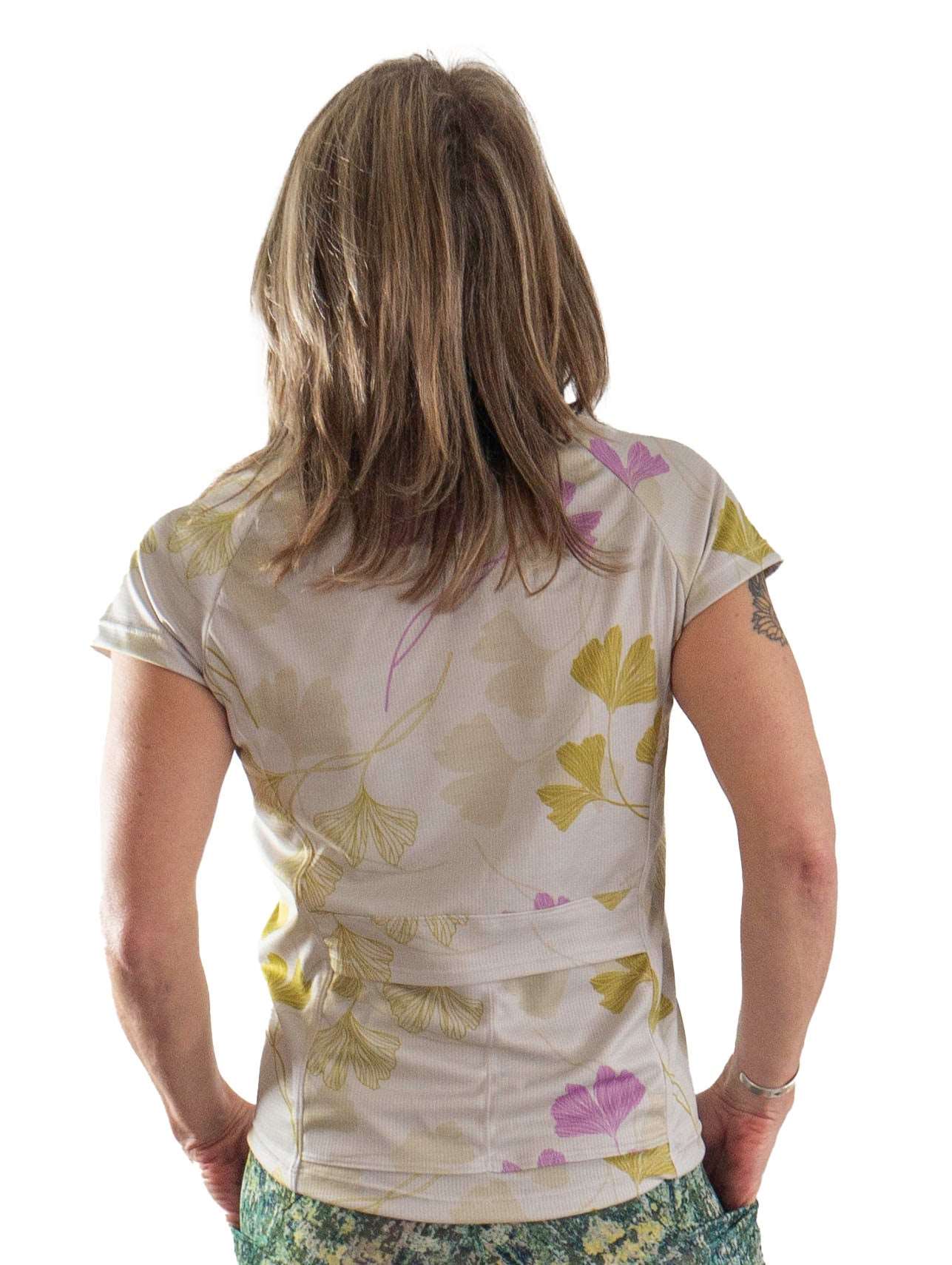 Moxie Tee jersey in moss floral pattern with moisture management technology.
